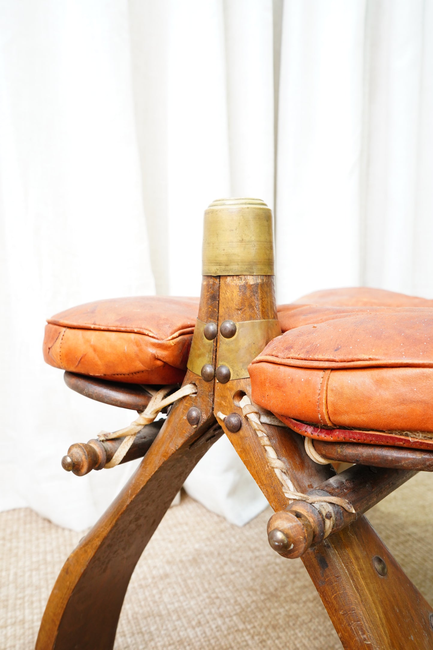Vintage Middle Eastern Camel Saddle Stool with Embossed Leather Cushion & Brass Accents (c. 1950s)