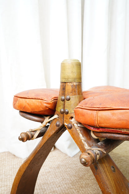 Vintage Middle Eastern Camel Saddle Stool with Embossed Leather Cushion & Brass Accents (c. 1950s)