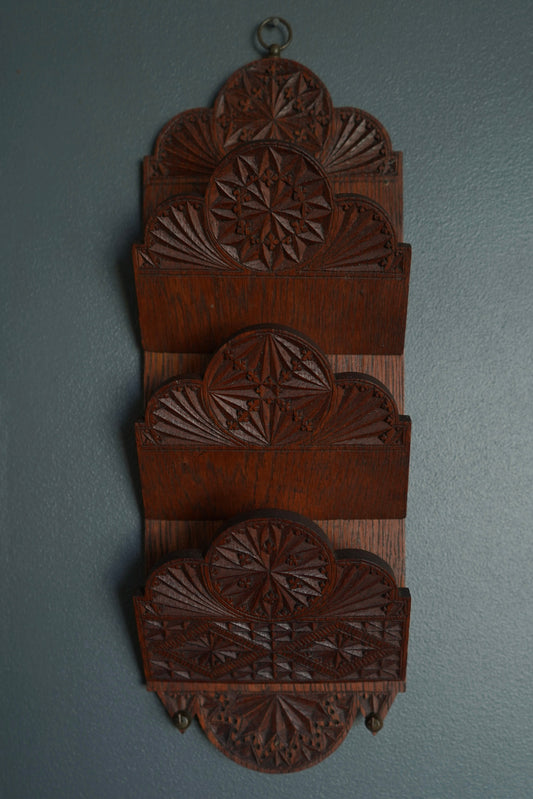 Wooden mail holder with hand-carved intricate carvings and two metal hooks