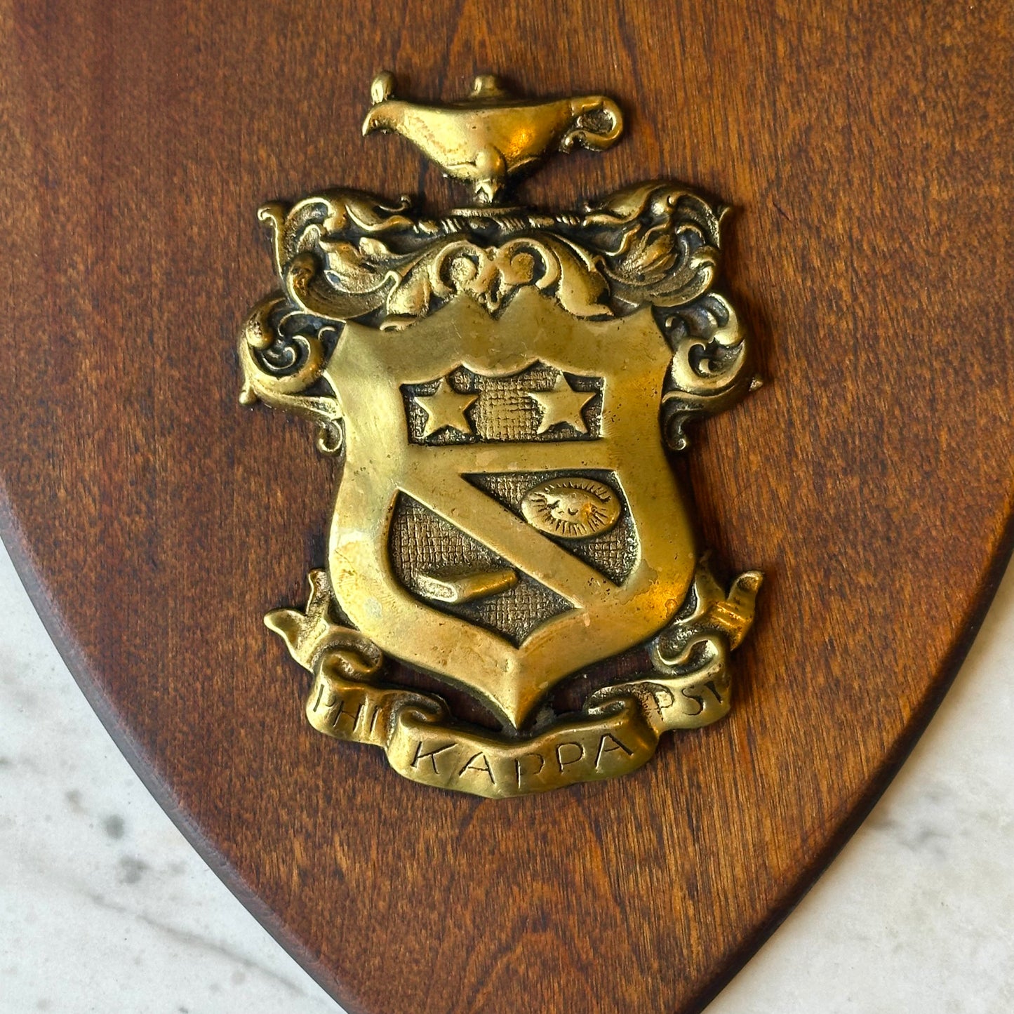 Vintage Kappa Psi Fraternity Brass Crest Plaque on Shield Backing