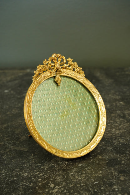 Antique French Gilt Brass Oval Picture Frame with Bow Crest